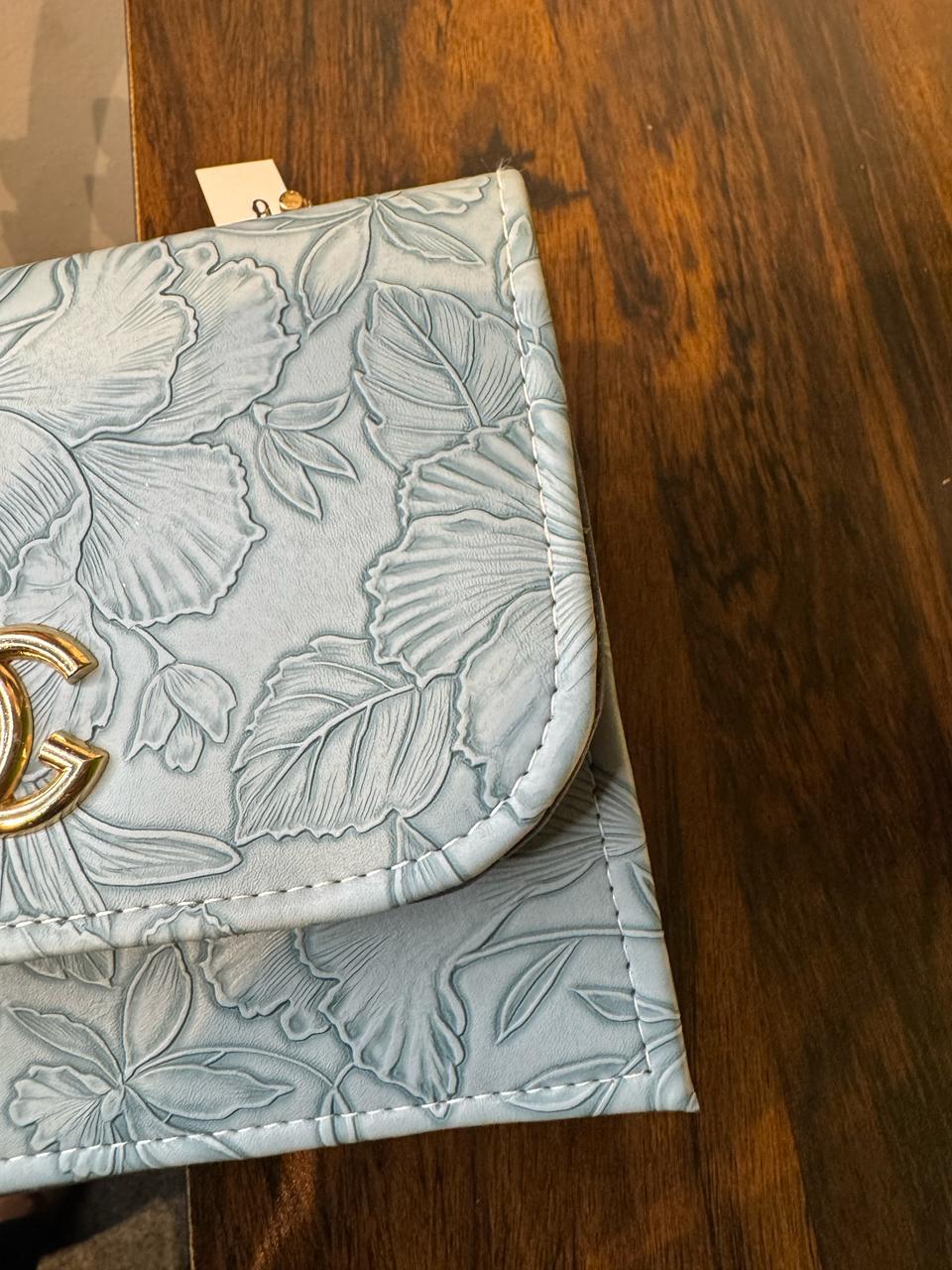 Chanel Sky Blue Floral Embossed Handbag by JB Style